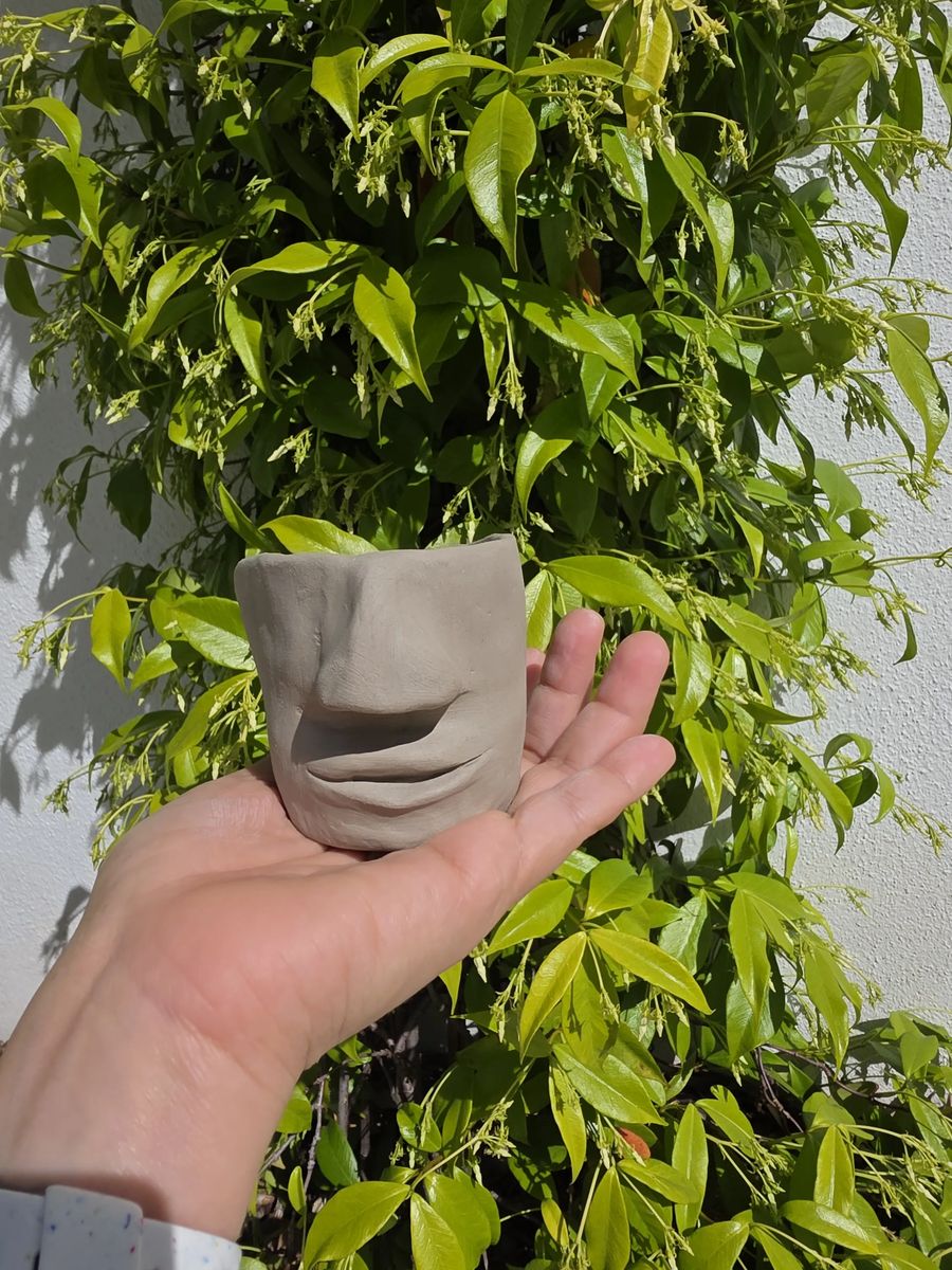 The Whisperer — raw clay